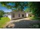 The house has a large sliding glass door which provides easy access to the backyard at 5717 Fairchase Ave, Charlotte, NC 28269