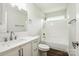 Bathroom features a tub and vanity, with modern fixtures and a sleek design at 5717 Fairchase Ave, Charlotte, NC 28269
