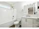 A well-lit bathroom features a shower and vanity for a clean, modern look at 5717 Fairchase Ave, Charlotte, NC 28269