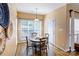Cozy breakfast nook area with a round table, perfect for casual dining at 7521 Plumcrest Ln, Harrisburg, NC 28075
