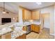 Open kitchen featuring granite countertops, stainless steel appliances, and ample cabinet space at 7521 Plumcrest Ln, Harrisburg, NC 28075