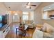 Spacious living room with hardwood floors and view of the entry way at 7521 Plumcrest Ln, Harrisburg, NC 28075