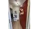 Inviting foyer with a wood floor, decorative wreath, and stylish accents, creating a warm and welcoming entrance at 8322 Summerglen Cir, Charlotte, NC 28227