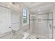 Bright bathroom showcases a glass enclosed shower, marble countertop, and ample natural light at 920 Terramore Dr, Waxhaw, NC 28173