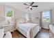 Comfortable bedroom with hardwood floors, and two windows at 920 Terramore Dr, Waxhaw, NC 28173