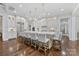 Gourmet kitchen with a large center island, modern lighting, and stainless steel appliances at 920 Terramore Dr, Waxhaw, NC 28173
