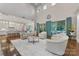 Open-concept living room with high ceilings, a wet bar, and seamless access to the outdoors at 920 Terramore Dr, Waxhaw, NC 28173