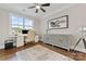 Bright office with hardwood floors, stylish desk, and large window at 920 Terramore Dr, Waxhaw, NC 28173