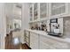 Stylish bar with a beverage fridge, wine storage, and a coffee maker, perfect for entertaining at 920 Terramore Dr, Waxhaw, NC 28173