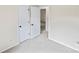 Bedroom featuring new carpet and closet, providing storage and style at 10016 Heathergate Ln, Mint Hill, NC 28227