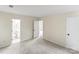 Spacious bedroom with neutral carpet, leading to the bathroom and hallway at 10016 Heathergate Ln, Mint Hill, NC 28227