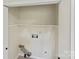 Empty storage closet, prepped for a washer and dryer at 10016 Heathergate Ln, Mint Hill, NC 28227