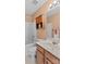 Bathroom featuring a shower, sink, mirror, and wooden cabinets at 103 Prestwick Ct, Salisbury, NC 28146