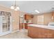 View of kitchen area leading to backyard door at 103 Prestwick Ct, Salisbury, NC 28146