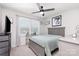 Comfortable bedroom with neutral color scheme, soft lighting, and window views, creating a relaxing ambiance at 1117 Laurel Woods Dr, Gastonia, NC 28052