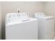 Convenient laundry area with a white washer and dryer at 1117 Laurel Woods Dr, Gastonia, NC 28052