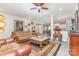 Comfortable living room showcasing unique furniture and decor, seamlessly connected to the dining area at 1117 Laurel Woods Dr, Gastonia, NC 28052
