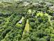 Overview of a secluded property surrounded by dense woods, ensuring privacy at 12143 Asbury Chapel Rd, Huntersville, NC 28078