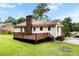 Exterior of house featuring wooden deck and green grassy area at 1617 Mulberry Cir, Rock Hill, SC 29732