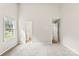 Bedroom with neutral carpet and access to ensuite bathroom at 1617 Mulberry Cir, Rock Hill, SC 29732