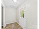 Bright entryway with vinyl flooring and a white front door at 1617 Mulberry Cir, Rock Hill, SC 29732