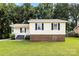Ranch home with a well-manicured lawn and dark shutters at 1617 Mulberry Cir, Rock Hill, SC 29732