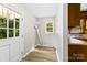 Functional laundry room with vinyl flooring and an exterior door at 1617 Mulberry Cir, Rock Hill, SC 29732
