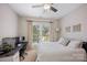 Bedroom with large window and view, comfortable bed, and a computer setup for work at 184 Melbourne Dr, Fort Mill, SC 29708