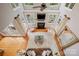 A large living room includes a fireplace and floor to ceiling windows at 184 Melbourne Dr, Fort Mill, SC 29708