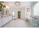 A luxurious primary bathroom includes a double vanity, soaking tub, glass-enclosed shower, and marble flooring at 184 Melbourne Dr, Fort Mill, SC 29708