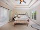 A primary suite features a decorative ceiling and an ensuite bathroom at 184 Melbourne Dr, Fort Mill, SC 29708