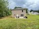 Spacious backyard with a patio, perfect for outdoor gatherings and relaxation at 1916 Country Way, Hickory, NC 28601