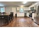Bright, open kitchen with stainless steel appliances and a dining area at 1916 Country Way, Hickory, NC 28601