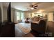 Comfortable living area with a large sectional sofa, ceiling fan, and natural light at 1916 Country Way, Hickory, NC 28601