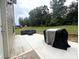Comfortable outdoor patio with seating and a grill for entertaining at 1916 Country Way, Hickory, NC 28601