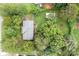 An aerial view of a property with a large backyard and mature trees at 200 Southwood Park Rd, Mooresville, NC 28117