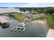 Waterfront property with a charming pier, outdoor seating, and beautiful views of the lake at 200 Southwood Park Rd, Mooresville, NC 28117