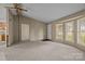 Spacious living room with a large window, and a doorway to another room at 200 Southwood Park Rd, Mooresville, NC 28117