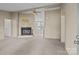 Inviting living room featuring a fireplace and a large opening to another room at 200 Southwood Park Rd, Mooresville, NC 28117