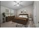 Bedroom featuring furniture and decor, including a queen bed with two windows for natural light at 200 Southwood Park Rd, Mooresville, NC 28117