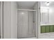 Bathroom with tiled shower enclosure, glass door, and vanity sink at 200 Southwood Park Rd, Mooresville, NC 28117