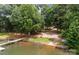 Lakefront community featuring a dock, picnic tables, and boating access at 200 Southwood Park Rd, Mooresville, NC 28117