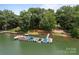A waterfront view featuring a dock and access to boating activities at 200 Southwood Park Rd, Mooresville, NC 28117