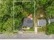 Aerial view showing property lines, home, deck, and surrounding wooded area at 2005 Scott Ave, Charlotte, NC 28203