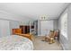Bedroom with unique interior architecture, wooden furniture, and warm lighting at 2005 Scott Ave, Charlotte, NC 28203