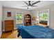 Comfortable bedroom with a large window and wooden floors at 2005 Scott Ave, Charlotte, NC 28203
