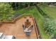Overhead view of wooden deck with outdoor seating overlooking the backyard with a garden at 2005 Scott Ave, Charlotte, NC 28203