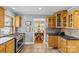 Kitchen with stainless steel appliances and view to dining area at 2005 Scott Ave, Charlotte, NC 28203