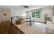 Bright bonus room featuring hardwood floors, comfortable seating, and lots of natural light at 2011 Fromby Ct, Charlotte, NC 28211