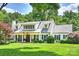 Charming two-story home features a well-manicured lawn and inviting curb appeal at 2011 Fromby Ct, Charlotte, NC 28211